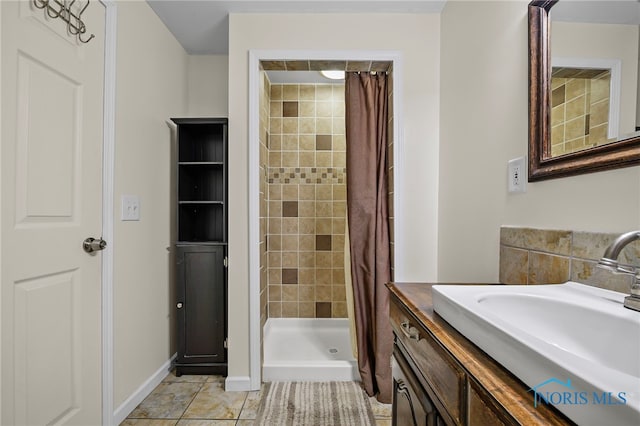 6961 Convent Blvd, Sylvania, OH 43560 - full bath with a tile shower, vanity, and tile patterned floors