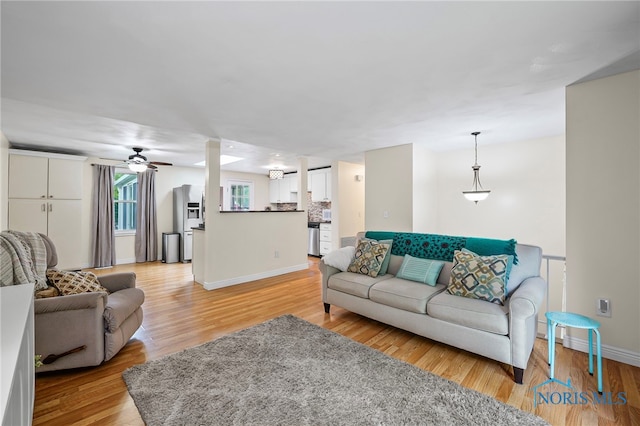 6961 Convent Blvd, Sylvania, OH 43560 - living area featuring ceiling fan and light wood-style flooring