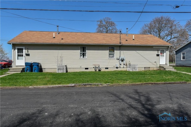 912 Virginia St, Port Clinton, OH 43452 - back of property with entry steps and a lawn