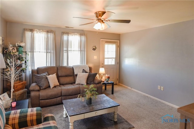912 Virginia St, Port Clinton, OH 43452 - carpeted living room with ceiling fan and baseboards