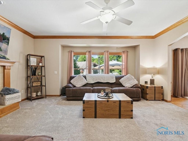 646 Whisperlake Rd, Holland, OH 43528 - carpeted living area featuring ornamental molding and ceiling fan
