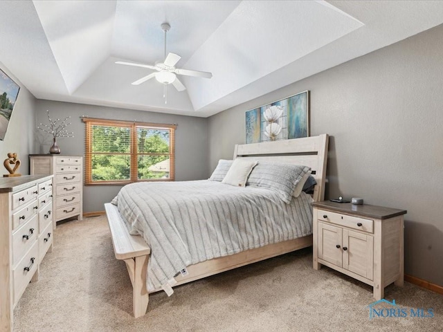 646 Whisperlake Rd, Holland, OH 43528 - bedroom with a raised ceiling, light carpet, and a ceiling fan