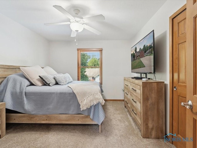 646 Whisperlake Rd, Holland, OH 43528 - bedroom with light carpet and a ceiling fan
