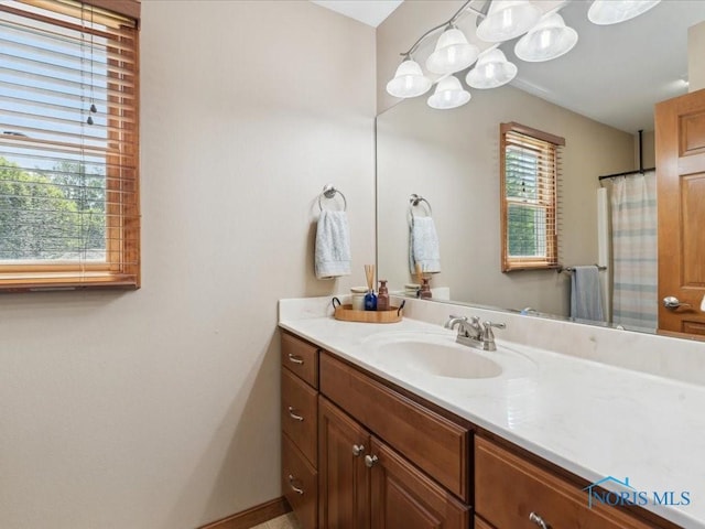 646 Whisperlake Rd, Holland, OH 43528 - full bath featuring vanity and curtained shower