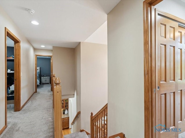 646 Whisperlake Rd, Holland, OH 43528 - hall featuring an upstairs landing, light colored carpet, and recessed lighting