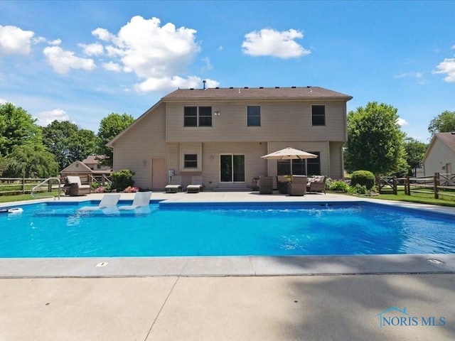 646 Whisperlake Rd, Holland, OH 43528 - swimming pool featuring an outdoor hangout area and a patio area