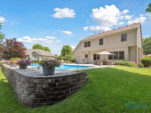 646 Whisperlake Rd, Holland, OH 43528 - outdoor pool featuring a lawn, a patio, and an outdoor living space
