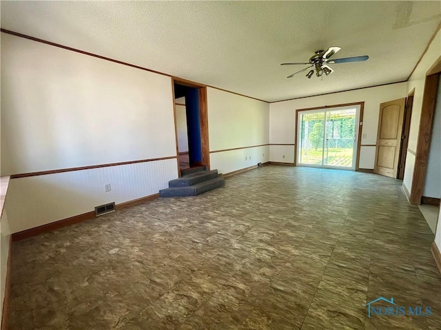 107 N Maple St, Payne, OH 45880 - unfurnished room with a ceiling fan and a textured ceiling