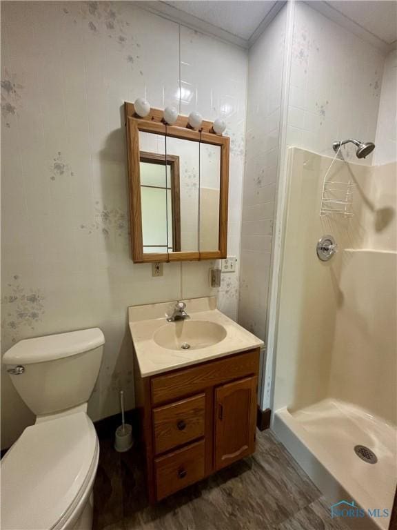 107 N Maple St, Payne, OH 45880 - full bath featuring a stall shower, vanity, ornamental molding, and wood finished floors