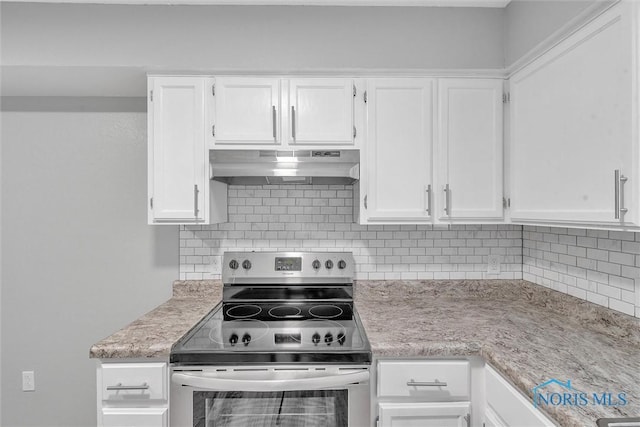 1845 Newport Ave, Toledo, OH 43613 - kitchen featuring under cabinet range hood, electric stove, white cabinetry, and tasteful backsplash