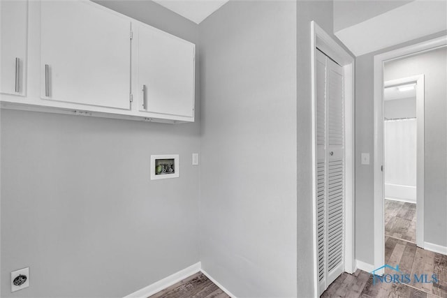 1845 Newport Ave, Toledo, OH 43613 - laundry area with cabinet space, washer hookup, hookup for an electric dryer, and wood finished floors