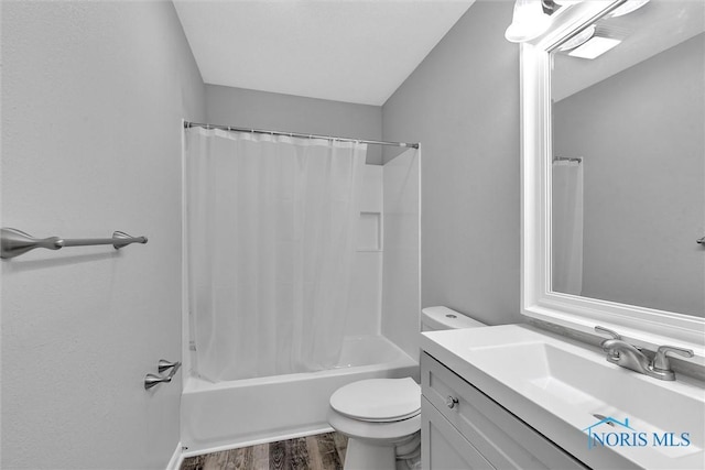 1845 Newport Ave, Toledo, OH 43613 - bathroom featuring vanity, shower / bath combination with curtain, and wood finished floors