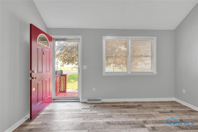 1845 Newport Ave, Toledo, OH 43613 - foyer with vaulted ceiling, wood finished floors, and plenty of natural light