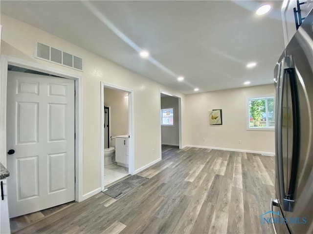 5240 Rambo Ln, Toledo, OH 43623 - spare room featuring light wood finished floors and recessed lighting
