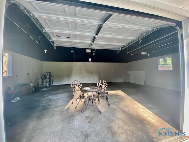 5240 Rambo Ln, Toledo, OH 43623 - garage featuring a garage door opener