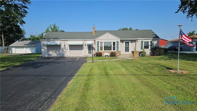 49 N Norden Rd, Oregon, OH 43616 - ranch-style house featuring asphalt driveway, a garage, a front lawn, and a chimney
