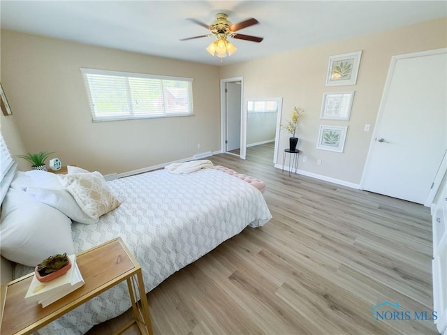 2148 Richards Rd Unit 6, Toledo, OH 43606 - bedroom with wood finished floors and a ceiling fan