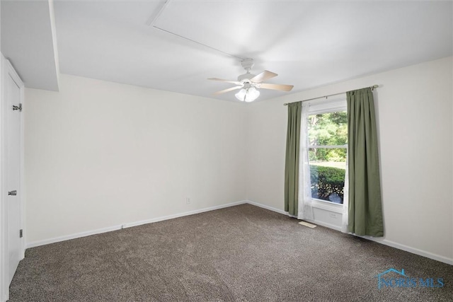 5679 Monroe St Unit 118, Sylvania, OH 43560 - carpeted spare room featuring ceiling fan and baseboards