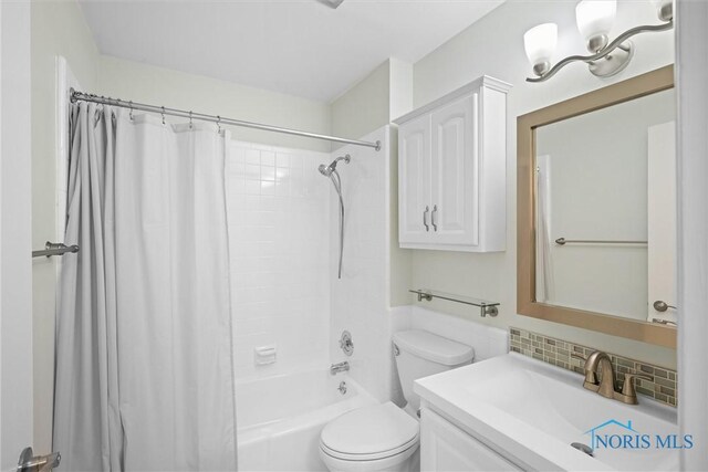 5679 Monroe St Unit 118, Sylvania, OH 43560 - full bathroom featuring vanity, shower / tub combo, and decorative backsplash