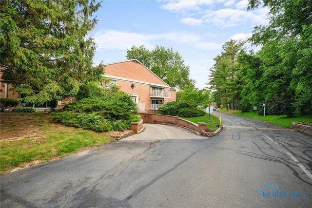 5679 Monroe St Unit 118, Sylvania, OH 43560 - view of front of home with asphalt driveway