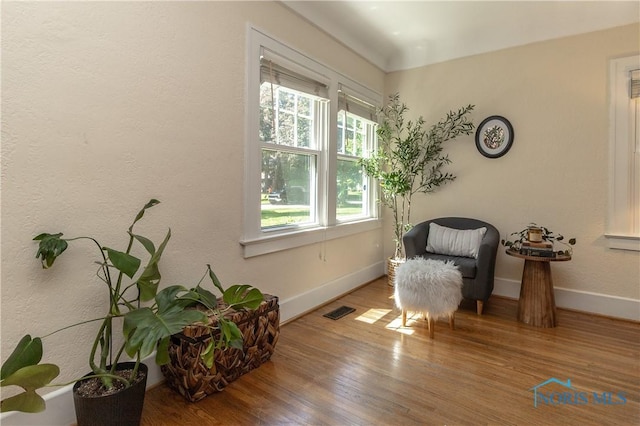 2448 Orchard Rd, Ottawa Hills, OH 43606 - living area featuring baseboards and wood finished floors