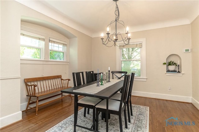 2448 Orchard Rd, Ottawa Hills, OH 43606 - dining space featuring a chandelier and wood finished floors