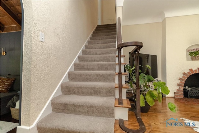 2448 Orchard Rd, Ottawa Hills, OH 43606 - stairs with a textured wall and wood finished floors