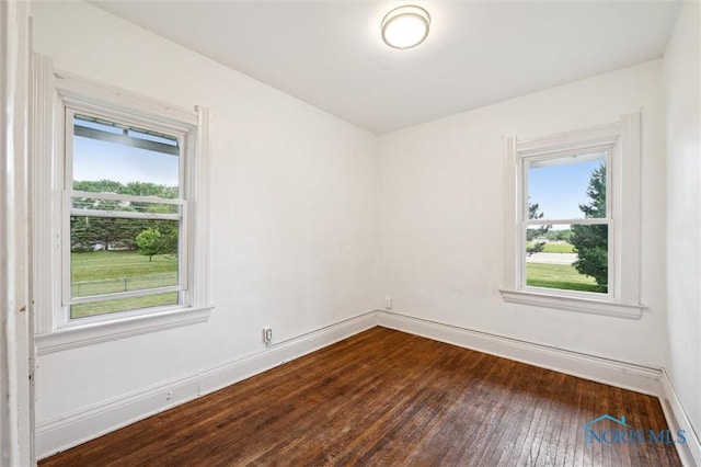 3042 Schneider Rd, Toledo, OH 43614 - empty room featuring baseboards and dark wood-style flooring