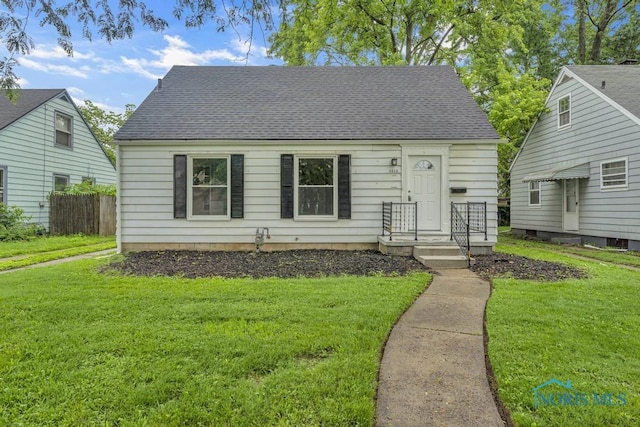 1510 Schuyler Rd, Toledo, OH 43612 - view of front of house featuring roof with shingles