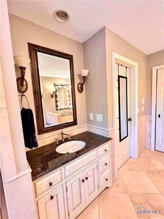 2720 Derby Rd, Ottawa Hills, OH 43615 - bathroom featuring vanity and tile patterned floors