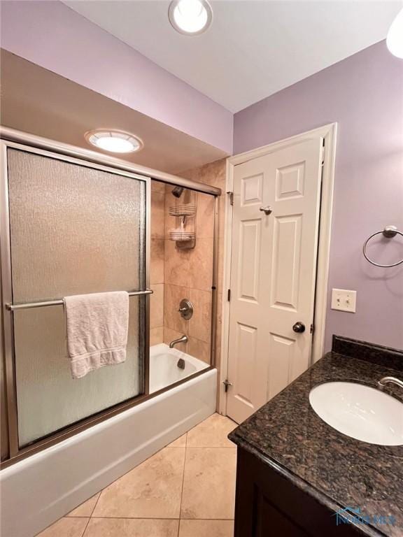 2720 Derby Rd, Ottawa Hills, OH 43615 - full bath featuring shower / bath combination with glass door, tile patterned floors, and vanity