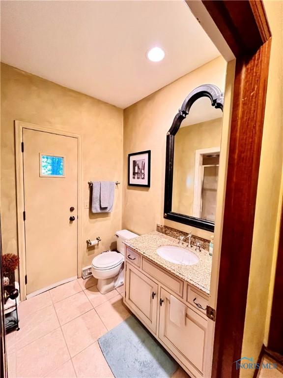 2720 Derby Rd, Ottawa Hills, OH 43615 - bathroom with tile patterned flooring and vanity