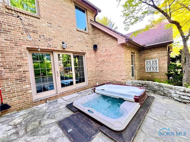 2720 Derby Rd, Ottawa Hills, OH 43615 - view of patio / terrace with a covered hot tub
