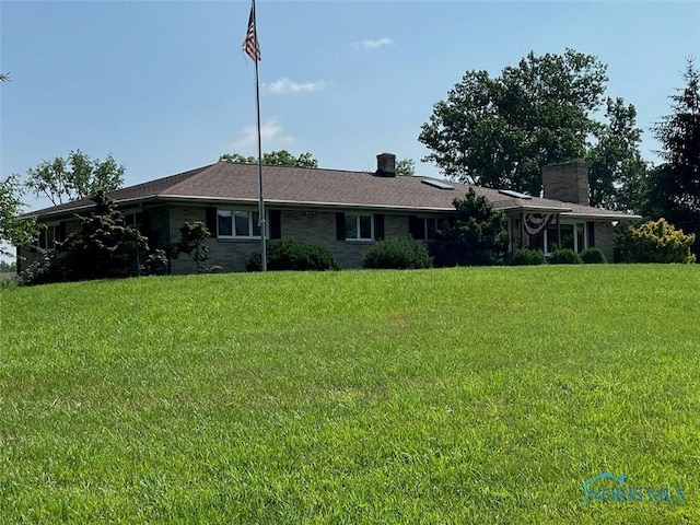 3550 Limerick Rd, Clyde, OH 43410 - ranch-style house featuring a chimney and a front lawn