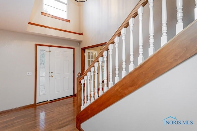 820 Weatherstone Rd, Holland, OH 43528 - foyer entrance with wood finished floors, a towering ceiling, and stairway