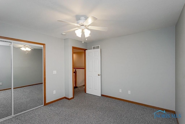 820 Weatherstone Rd, Holland, OH 43528 - unfurnished bedroom with carpet, a closet, and ceiling fan
