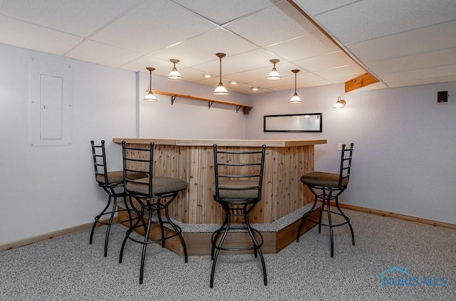 820 Weatherstone Rd, Holland, OH 43528 - indoor dry bar with carpet flooring, electric panel, and a drop ceiling