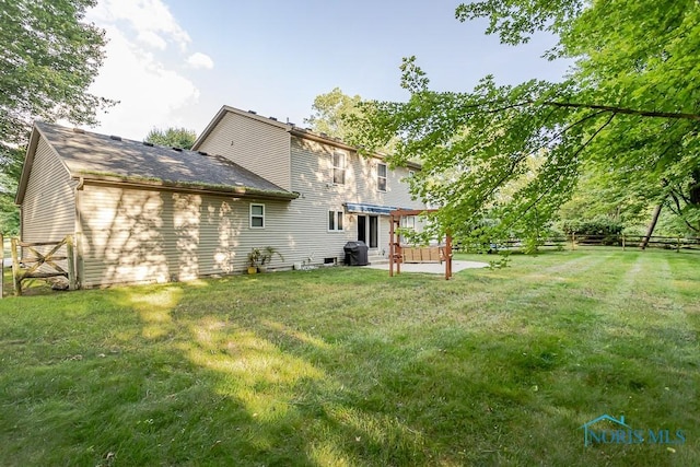 820 Weatherstone Rd, Holland, OH 43528 - rear view of house with a patio