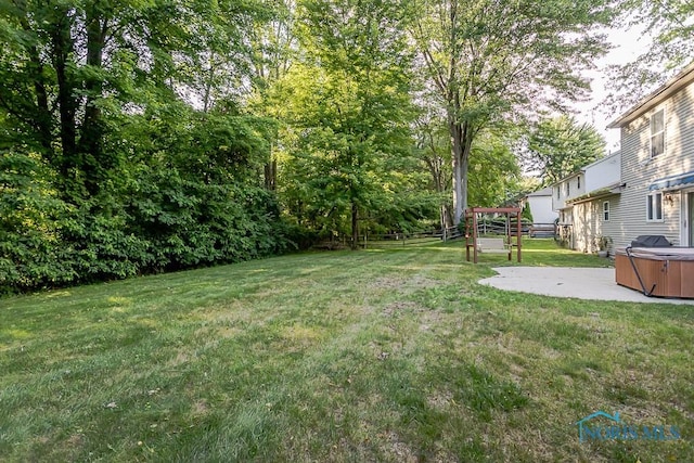820 Weatherstone Rd, Holland, OH 43528 - view of yard with a hot tub and a patio