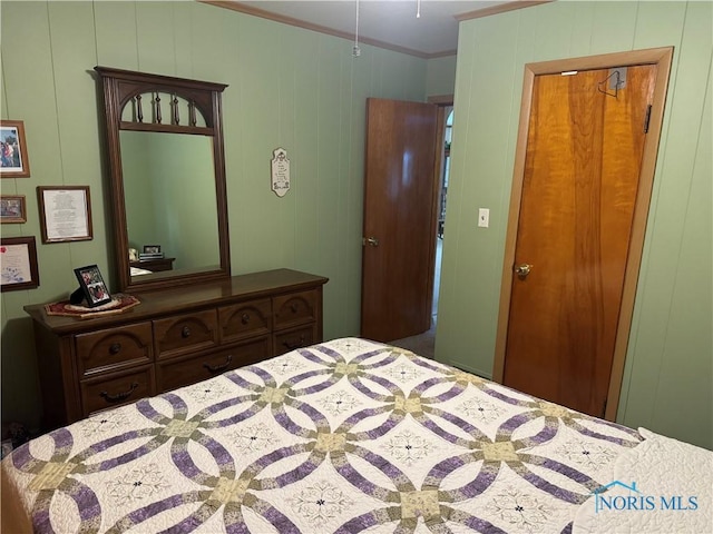 520 W Main St, Leipsic, OH 45856 - bedroom featuring ornamental molding and a decorative wall