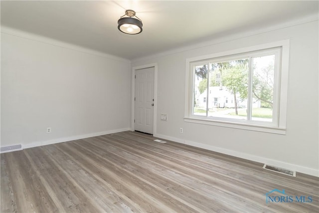 926 Searles Rd, Toledo, OH 43607 - empty room featuring light wood finished floors