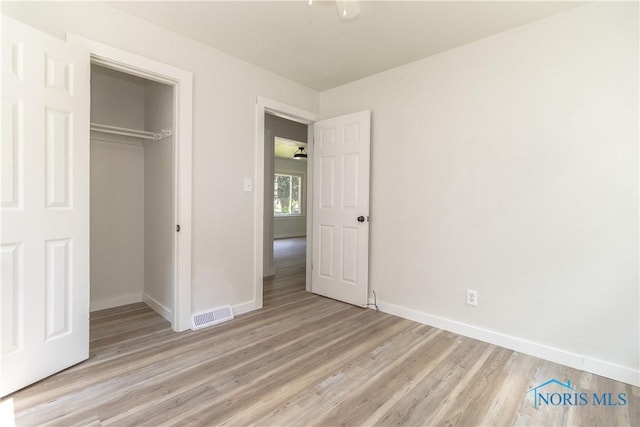 926 Searles Rd, Toledo, OH 43607 - unfurnished bedroom featuring light wood-type flooring and a closet