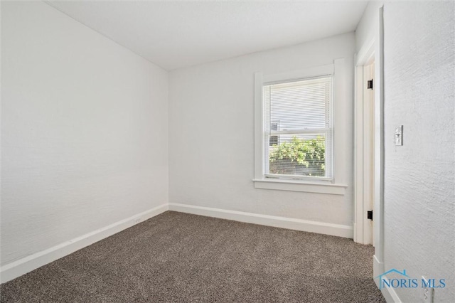 3627 Burton Ave, Toledo, OH 43612 - unfurnished room featuring carpet and baseboards