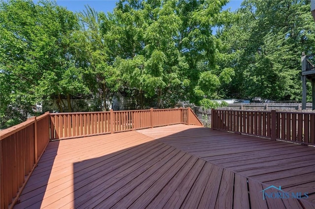 3627 Burton Ave, Toledo, OH 43612 - wooden deck featuring a fenced backyard