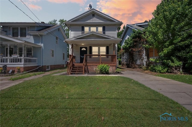 3627 Burton Ave, Toledo, OH 43612 - traditional style home featuring a porch and a front yard