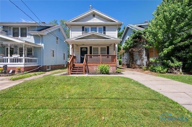 3627 Burton Ave, Toledo, OH 43612 - traditional style home featuring a porch and a front yard