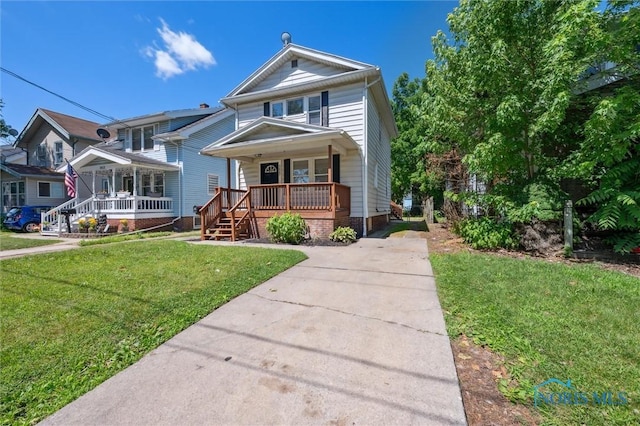 3627 Burton Ave, Toledo, OH 43612 - view of front of property with covered porch, concrete driveway, a front yard, and crawl space