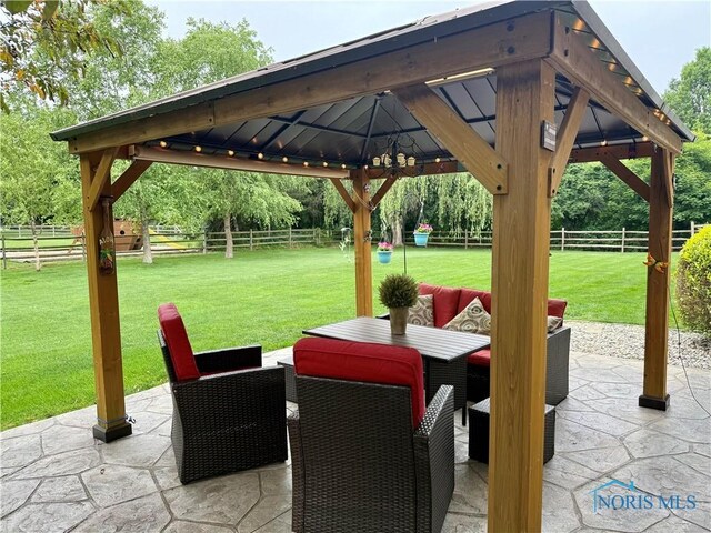 9627 Sheffield Rd, Perrysburg, OH 43551 - fenced backyard featuring a gazebo, outdoor dining space, and a patio