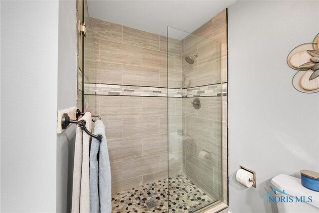 9627 Sheffield Rd, Perrysburg, OH 43551 - bathroom featuring a stall shower and toilet