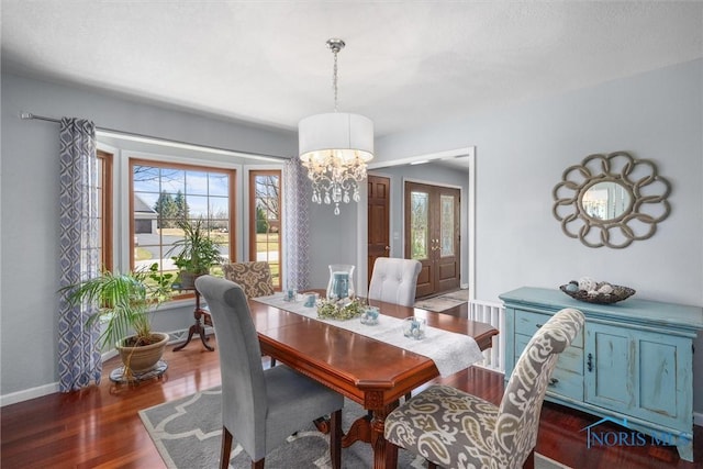 9627 Sheffield Rd, Perrysburg, OH 43551 - dining space featuring a chandelier and dark wood-style flooring